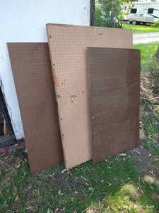 lot 602 image: Three Large Pegboards Framed Behind