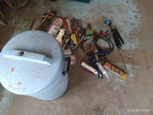 lot 637 image: Trash Bin w Hand Tools, Charging Cables, Bike Pump, Snips, Saws, Etc