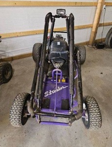 lot 5 image: Used Strider Go-Kart in Purple with Roll Cage