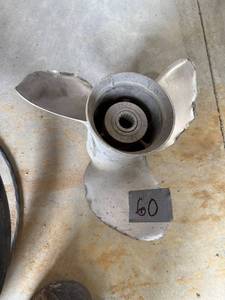 lot 60 image: Used Aluminum Boat Propeller Marked 389924