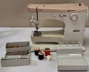 lot 50 image: VINTAGE Elna Special Sewing Machine In Metal Case