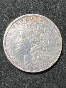 lot 11 image: 1889-O US MORGAN SILVER DOLLAR