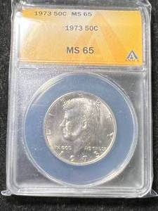 lot 25 image: 1973 US KENNEDY HALF DOLLAR ANACS MS65