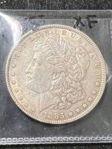 lot 28 image: 1885 US MORGAN SILVER DOLLAR XF
