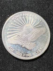 lot 34 image: 1 TROY OZ .999 FINE SILVER GOD BLESS AMERICA ROUND