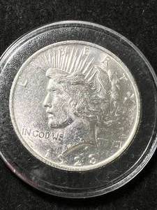 lot 39 image: 1923 US PEACE SILVER DOLLAR IN AIRTITE