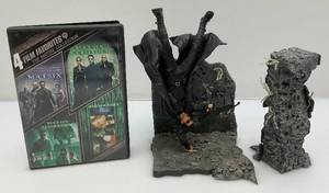 lot 31 image: Vintage Collectible Matrix Action Figure With DVD Set (Missing One Disc.)