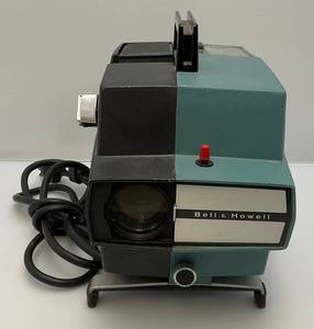 lot 55 image: Vintage Bell & Howell Model 745 Movie Projector (Works)