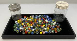 lot 58 image: Bottle Of Misc. Vintage Marbles (Some Glow Under UV Light)