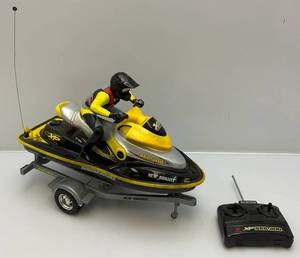 lot 90 image: New Bright 16 XP Bombardier RC Remote Control SEA-DOO Used Condition