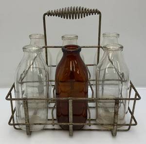 lot 141 image: Vintage 6 Section Metal Quart Size MilkOil Bottle Carrier With Six Quart Size Milk Bottles Including Amber Colored