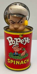 lot 193 image: 1957 Popeye Spinach Can Toy (VERY COOL)