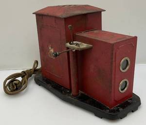 lot 221 image: Antique NIC Paper Cartoon Tin Projector