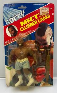 Est. $200.00 - $300.00 1983 PAC Phoenix Toys ROCKY Mr. 'T' As Clubber Lane Fully poseable Doll On Original Card (New Old Stock)  Packaging Shows Wear