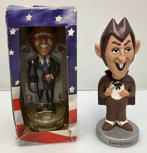 lot 273 image: Original General Mills (Funko) Count Dracula Wacky Wobbler Bobble head & Obama Bobble Head In Original Pack