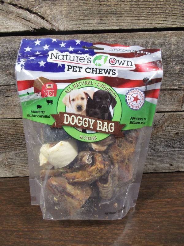 lot 238 image: Natures Own USA Doggy Bag Chew Treats Assorted 12pk
