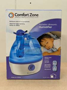 lot 52 image: Whisper-quiet Cool Mist Portable Ultrasonic Humidifier with Dual Nozzles and Auto Shut-Off