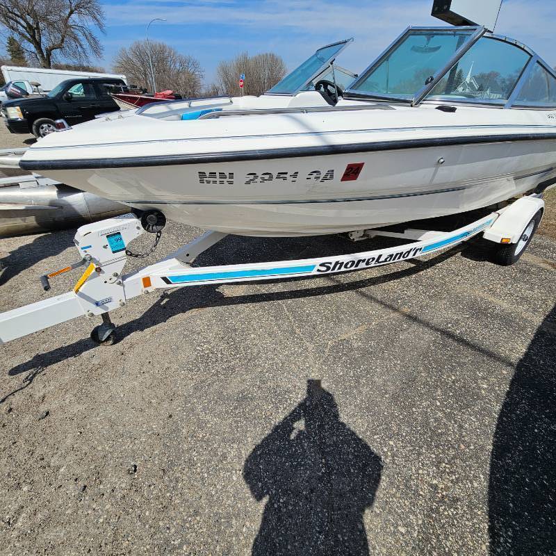 lot 59 image: 92 Chapperal Fiberglass Boat with Trailer