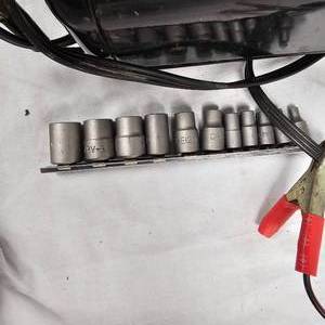 lot 5 image: Sears Diehard Battery Charger and Tork Socket Set