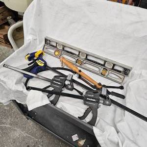 lot 20 image: Squeeze Clamps-2 Aluminum Levels-Hand Trap Thrower