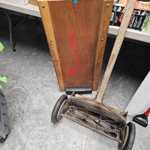 lot 53 image: Vintage Push Mower and Isle Jeeper Creeper and Fish Cleaning Board