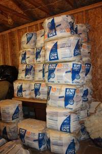 lot B-40 image: Set of Stacked R25 Fiberglass Insulation Bags from Johns Manville