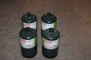 lot 65 image: Set of 4 Coleman 16 oz Propane Cylinders