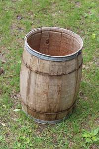 lot 69 image: Vintage Wooden Barrel with Metal Hoop Accents
