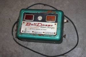lot 73 image: Vintage BullDozer Electric Fence Charger