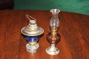 lot 101 image: Vintage Oil Lamps Set of 2 with Glass Shades