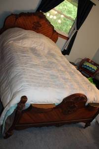 lot 103 image: Antique Wooden Full-Size Bed Frame with Ornate Carvings