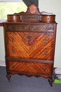 lot 110 image: Antique Mahogany Dresser with Intricate Carvings and Brass Handles