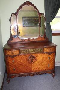 lot 111 image: Antique Mahogany Dresser with Ornate Mirror and Decorative Carvings