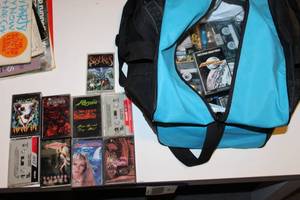 lot 145 image: Collection of Rock and Metal Music Cassette Tapes in Carry Bag
