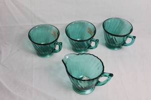 lot 42 image: Set of 4 Swirl Ultramarine Glass Cups and Creamer
