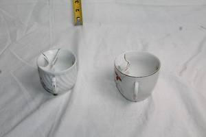 lot 87 image: Set of 2 Vintage German Mustache Cups with Floral Patterns