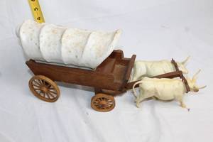 lot 111 image: Vintage Harolds Club Reno or Bust Ceramic Covered Wagon Figurine