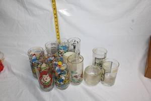 lot A-128 image: Collection of 15 Flashback Cartoon and Movie-Themed Glasses