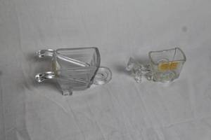 lot 195 image: Pair of Vintage Glass Candy Containers Wheelbarrow and Horse-Drawn Wagon