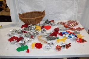 lot 216 image: Collection of Metal and Plastic Cookie Cutters with Wicker Basket
