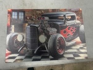 lot 70 image: MAN CAVE ART WORK