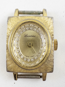 lot 9 image: Ladys lucerne gold tone with rhinestone inner bezel SN #1110 Gold Tone Base Metal Mechanical Watch. Not working