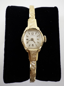 lot 12 image: Ladys Timex bangle style Gold Tone Base Metal Mechanical Watch. Not working
