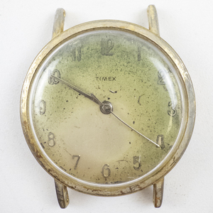 lot 19 image: Mens Timex  watch with silver patina and missing most of the movement Gold Tone base metal Mechanical Watch. Not working