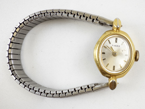 lot 30 image: Ladys Timex art deco style Gold Tone Base Metal Mechanical Watch. Starts when wound