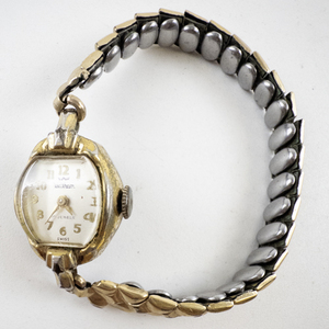 lot 34 image: Ladys Waltham 17 jewel art deco style Gold Tone Base Metal Mechanical Watch. starts when wound
