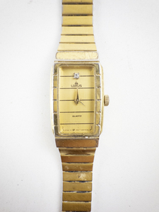 lot 48 image: Ladys Lorus Tank Style Gold Tone Base Metal Quartz Analog watch. Not working