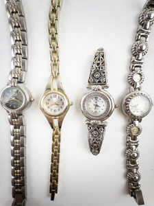 lot 50 image: Ladys Group of 4  faded glory, wrangler, express, Unknown Base Metal Quartz Analog watches. New batteries in all