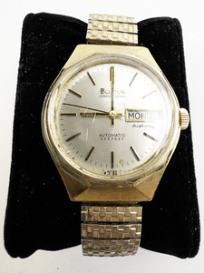 lot 114 image: Mens Bulova oceanographer with dual day, automatic Gold Tone Base Metal Mechanical Watch. Does not run