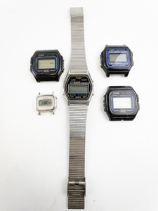 lot 117 image: unisex Group of 5  Casio, Seiko, & Tranel Silver Tone Base Metal Digital Watches. Working & Not Working